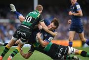 3 May 2025; Ryan Baird of Leinster is tackled by Fin Smith, left, and Angus Scott-Young of Northampton Saints during the Investec Champions Cup semi-final match between Leinster and Northampton Saints at the Aviva Stadium in Dublin. Photo by David Fitzgerald/Sportsfile