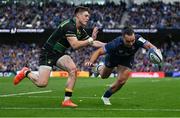3 May 2025; James Lowe of Leinster dives over to score his side's fifth try during the Investec Champions Cup semi-final match between Leinster and Northampton Saints at the Aviva Stadium in Dublin. Photo by Brendan Moran/Sportsfile