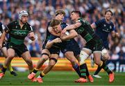 3 May 2025; Jordie Barrett of Leinster is tackled by Henry Pollock, left, and Fraser Dingwall of Northampton Saints during the Investec Champions Cup semi-final match between Leinster and Northampton Saints at the Aviva Stadium in Dublin. Photo by Brendan Moran/Sportsfile
