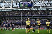 3 May 2025; Referee Pierre Brousset, centre, watches the TMO from the last play of the game during the Investec Champions Cup semi-final match between Leinster and Northampton Saints at the Aviva Stadium in Dublin. Photo by Brendan Moran/Sportsfile
