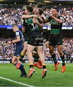 3 May 2025; Alex Mitchell, right, and Tommy Freeman of Northampton Saints, 14, celebrate with team-mates after the Investec Champions Cup semi-final match between Leinster and Northampton Saints at the Aviva Stadium in Dublin. Photo by Brendan Moran/Sportsfile