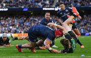 3 May 2025; Josh van der Flier of Leinster is tackled by Tommy Freeman of Northampton Saints short of the try line in the last play of the game during the Investec Champions Cup semi-final match between Leinster and Northampton Saints at the Aviva Stadium in Dublin. Photo by Brendan Moran/Sportsfile