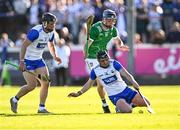 3 May 2025; Darragh Lyons of Waterford, supported by Ian Kenny, left, in action against David Reidy of Limerick during the Munster GAA Hurling Senior Championship Round 3 match between Waterford and Limerick at Walsh Park in Waterford. Photo by Piaras Ó Mídheach/Sportsfile