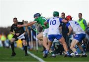 3 May 2025; David Reidy of Limerick keeps the ball in play despite the efforts of Jack Prendergast of Waterford during the Munster GAA Hurling Senior Championship Round 3 match between Waterford and Limerick at Walsh Park in Waterford. Photo by Tom Beary/Sportsfile