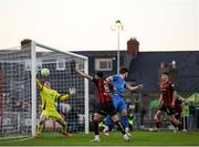 2 May 2025; Jordan Flores of Bohemians, 6, has a header on goal that subsequently hit the post and rebounded off Darragh Leahy of Waterford for Bohemians first goal during the SSE Airtricity Men's Premier Division match between Bohemians and Waterford at Dalymount Park in Dublin. Photo by Michael P Ryan/Sportsfile