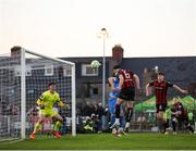 2 May 2025; Jordan Flores of Bohemians has a header on goal that subsequently hit the post and rebounded off Darragh Leahy of Waterford for Bohemians first goal during the SSE Airtricity Men's Premier Division match between Bohemians and Waterford at Dalymount Park in Dublin. Photo by Michael P Ryan/Sportsfile
