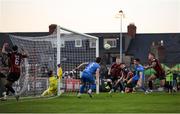 2 May 2025; Darragh Leahy of Waterford deflects the ball past goalkeeper Stephen McMullan for Bohemians first goal during the SSE Airtricity Men's Premier Division match between Bohemians and Waterford at Dalymount Park in Dublin. Photo by Michael P Ryan/Sportsfile