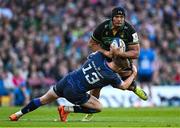 3 May 2025; Juarno Augustus of Northampton Saints is tackled by Garry Ringrose of Leinster during the Investec Champions Cup semi-final match between Leinster and Northampton Saints at the Aviva Stadium in Dublin. Photo by Seb Daly/Sportsfile