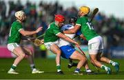 3 May 2025; Mark Fitzgerald of Waterford is tackled by, from left, Cian Lynch, Tom Morrissey and Barry Nash of Limerick during the Munster GAA Hurling Senior Championship Round 3 match between Waterford and Limerick at Walsh Park in Waterford. Photo by Tom Beary/Sportsfile