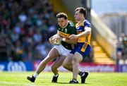 4 May 2025; David Clifford of Kerry is tackled by Cillian Brennan of Clare during the Munster GAA Football Senior Championship final match between Kerry and Clare at Fitzgerald Stadium in Killarney, Kerry. Photo by Brendan Moran/Sportsfile