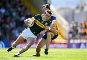 4 May 2025; David Clifford of Kerry is tackled by Cillian Brennan of Clare during the Munster GAA Football Senior Championship final match between Kerry and Clare at Fitzgerald Stadium in Killarney, Kerry. Photo by Brendan Moran/Sportsfile