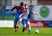 4 May 2025; Joseph Mouret of College Corinthians in action against Jack Kelly of Mervue United during the FAI Youth Cup final match between Mervue United and College Corinthians at Eamonn Deacy Park in Galway. Photo by Tyler Miller/Sportsfile
