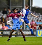 4 May 2025; Samuel Dow of College Corinthians in action against Sean Nnadi of Mervue United during the FAI Youth Cup final match between Mervue United and College Corinthians at Eamonn Deacy Park in Galway. Photo by Tyler Miller/Sportsfile