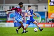 4 May 2025; Dawit Dems Woldemariam of Mervue United in action against Kealan Crowe of College Corinthians during the FAI Youth Cup final match between Mervue United and College Corinthians at Eamonn Deacy Park in Galway. Photo by Tyler Miller/Sportsfile