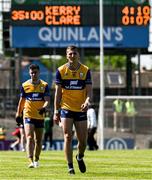 4 May 2025; Emmet McMahon of Clare leaves the pitch at half time with the scoreboard showing Kerry leading 4-10 to 0-07 during the Munster GAA Football Senior Championship final match between Kerry and Clare at Fitzgerald Stadium in Killarney, Kerry. Photo by Brendan Moran/Sportsfile