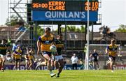 4 May 2025; Eoin Cleary of Clare in action against Micheál Burns of Kerry during the Munster GAA Football Senior Championship final match between Kerry and Clare at Fitzgerald Stadium in Killarney, Kerry. Photo by Brendan Moran/Sportsfile