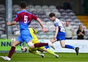 4 May 2025; Kai O'Neill of College Corinthians shoots to score his side's first goal during the FAI Youth Cup final match between Mervue United and College Corinthians at Eamonn Deacy Park in Galway. Photo by Tyler Miller/Sportsfile