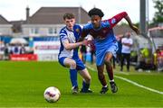 4 May 2025; Dawit Dems Woldemariam of Mervue United in action against Samuel Dow of College Corinthians during the FAI Youth Cup final match between Mervue United and College Corinthians at Eamonn Deacy Park in Galway. Photo by Tyler Miller/Sportsfile