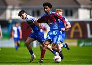 4 May 2025; Dawit Dems Woldemariam of Mervue United in action against Harry Jeffers of College Corinthians during the FAI Youth Cup final match between Mervue United and College Corinthians at Eamonn Deacy Park in Galway. Photo by Tyler Miller/Sportsfile