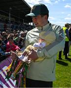 4 May 2025; Paul Murphy of Kerry with his month old daughter Lucy and the cup after the Munster GAA Football Senior Championship final match between Kerry and Clare at Fitzgerald Stadium in Killarney, Kerry. Photo by Brendan Moran/Sportsfile