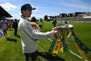 4 May 2025; Paul Murphy of Kerry with his month old daughter Lucy and the cup after the Munster GAA Football Senior Championship final match between Kerry and Clare at Fitzgerald Stadium in Killarney, Kerry. Photo by Brendan Moran/Sportsfile