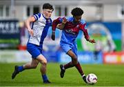 4 May 2025; Dawit Dems Woldemariam of Mervue United in action against Kealan Crowe of College Corinthians during the FAI Youth Cup final match between Mervue United and College Corinthians at Eamonn Deacy Park in Galway. Photo by Tyler Miller/Sportsfile