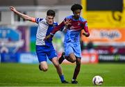 4 May 2025; Dawit Dems Woldemariam of Mervue United in action against Kealan Crowe of College Corinthians during the FAI Youth Cup final match between Mervue United and College Corinthians at Eamonn Deacy Park in Galway. Photo by Tyler Miller/Sportsfile