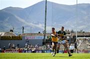 4 May 2025; Seán O'Shea of Kerry and Manus Doherty of Clare contest a ball during the Munster GAA Football Senior Championship final match between Kerry and Clare at Fitzgerald Stadium in Killarney, Kerry. Photo by Brendan Moran/Sportsfile