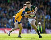 4 May 2025; Ruairí Murphy of Kerry in action against Conor Meaney of Clare during the Munster GAA Football Senior Championship final match between Kerry and Clare at Fitzgerald Stadium in Killarney, Kerry. Photo by Brendan Moran/Sportsfile