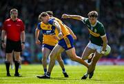 4 May 2025; David Clifford of Kerry evades the tackle of Cillian Brennan of Clare during the Munster GAA Football Senior Championship final match between Kerry and Clare at Fitzgerald Stadium in Killarney, Kerry. Photo by Brendan Moran/Sportsfile