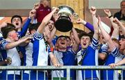 4 May 2025; College Corinthians captain Kealan Crowe lifts the cup alongside team-mates after the FAI Youth Cup final match between Mervue United and College Corinthians at Eamonn Deacy Park in Galway. Photo by Tyler Miller/Sportsfile