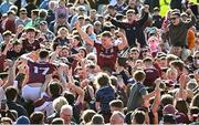 4 May 2025; Galway players, including Jack Glynn, celebrate with supporters after their side's victory in the Connacht GAA Football Senior Championship final match between Mayo and Galway at Hastings Insurance MacHale Park in Castlebar, Mayo. Photo by Seb Daly/Sportsfile