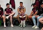 4 May 2025; Páidí Conroy, son of Paul Conroy, number 8, sprays water in the dressing room after the Connacht GAA Football Senior Championship final match between Mayo and Galway at Hastings Insurance MacHale Park in Castlebar, Mayo. Photo by David Fitzgerald/Sportsfile