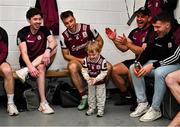 4 May 2025; Páidí Conroy, son of Paul Conroy, number 8, sprays water in the dressing room after the Connacht GAA Football Senior Championship final match between Mayo and Galway at Hastings Insurance MacHale Park in Castlebar, Mayo. Photo by David Fitzgerald/Sportsfile