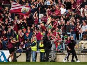 4 May 2025; Galway supporters behind manager Padraic Joyce celebrate during the Connacht GAA Football Senior Championship final match between Mayo and Galway at Hastings Insurance MacHale Park in Castlebar, Mayo. Photo by David Fitzgerald/Sportsfile