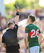 4 May 2025; Referee Paddy Neilan shows a black card to Mayo's Rory Brickenden during the Connacht GAA Football Senior Championship final match between Mayo and Galway at Hastings Insurance MacHale Park in Castlebar, Mayo. Photo by Seb Daly/Sportsfile