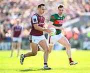 4 May 2025; Cillian McDaid of Galway in action against Matthew Ruane of Mayo during the Connacht GAA Football Senior Championship final match between Mayo and Galway at Hastings Insurance MacHale Park in Castlebar, Mayo. Photo by Seb Daly/Sportsfile