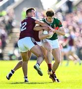 4 May 2025; Sam Callinan of Mayo is tackled by Galway players Cillian McDaid, left, and John Maher during the Connacht GAA Football Senior Championship final match between Mayo and Galway at Hastings Insurance MacHale Park in Castlebar, Mayo. Photo by Seb Daly/Sportsfile