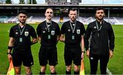 4 May 2025; Referee Ruben Collins, second from left, and his officials after the FAI Youth Cup final match between Mervue United and College Corinthians at Eamonn Deacy Park in Galway. Photo by Tyler Miller/Sportsfile