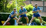 5 May 2025; Leinster players, from left, Garry Ringrose, Ross Byrne and James Lowe during Leinster Rugby squad training at UCD in Dublin. Photo by Seb Daly/Sportsfile
