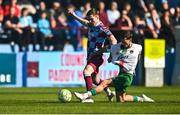 5 May 2025; Conor Kane of Drogheda United  in action against Evan McLaughlin of Cork City during the SSE Airtricity Men's Premier Division match between Drogheda United and Cork City at Sullivan & Lambe Park in Drogheda, Louth. Photo by Tyler Miller/Sportsfile