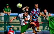 5 May 2025; Douglas James-Taylor of Drogheda United heads on goal despite pressure from Sean Murray of Cork City during the SSE Airtricity Men's Premier Division match between Drogheda United and Cork City at Sullivan & Lambe Park in Drogheda, Louth. Photo by Tyler Miller/Sportsfile