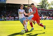 5 May 2025; Kameron Ledwidge of Shelbourne in action against Sam Glenfield of Waterford during the SSE Airtricity Men's Premier Division match between Shelbourne and Waterford at Tolka Park in Dublin. Photo by Seb Daly/Sportsfile