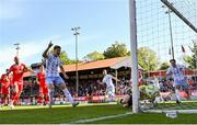 5 May 2025; Tommy Lonergan of Waterford, left, celebrates his side's first goal, scored by teammate Padraig Amond, not pictured, during the SSE Airtricity Men's Premier Division match between Shelbourne and Waterford at Tolka Park in Dublin. Photo by Seb Daly/Sportsfile