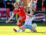 5 May 2025; Harry Wood of Shelbourne in action against Sam Glenfield of Waterford during the SSE Airtricity Men's Premier Division match between Shelbourne and Waterford at Tolka Park in Dublin. Photo by Seb Daly/Sportsfile
