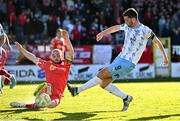 5 May 2025; Padraig Amond of Waterford has a shot blocked by Shelbourne's Mark Coyle during the SSE Airtricity Men's Premier Division match between Shelbourne and Waterford at Tolka Park in Dublin. Photo by Seb Daly/Sportsfile