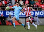 5 May 2025; Joe Redmond of St Patrick's Athletic in action against Danny Mullen of Derry City during the SSE Airtricity Men's Premier Division match between Derry City and St Patrick's Athletic at The Ryan McBride Brandywell Stadium in Derry. Photo by Stephen McCarthy/Sportsfile