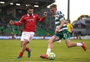 5 May 2025; Michael Noonan of Shamrock Rovers in action against Ronan Manning of Sligo Rovers during the SSE Airtricity Men's Premier Division match between Shamrock Rovers and Sligo Rovers at Tallaght Stadium in Dublin. Photo by David Fitzgerald/Sportsfile