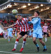 5 May 2025; Ronan Boyce of Derry City in action against Kian Leavy of St Patrick's Athletic during the SSE Airtricity Men's Premier Division match between Derry City and St Patrick's Athletic at The Ryan McBride Brandywell Stadium in Derry. Photo by Stephen McCarthy/Sportsfile