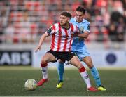 5 May 2025; Ronan Boyce of Derry City in action against Anto Breslin of St Patrick's Athletic during the SSE Airtricity Men's Premier Division match between Derry City and St Patrick's Athletic at The Ryan McBride Brandywell Stadium in Derry. Photo by Stephen McCarthy/Sportsfile